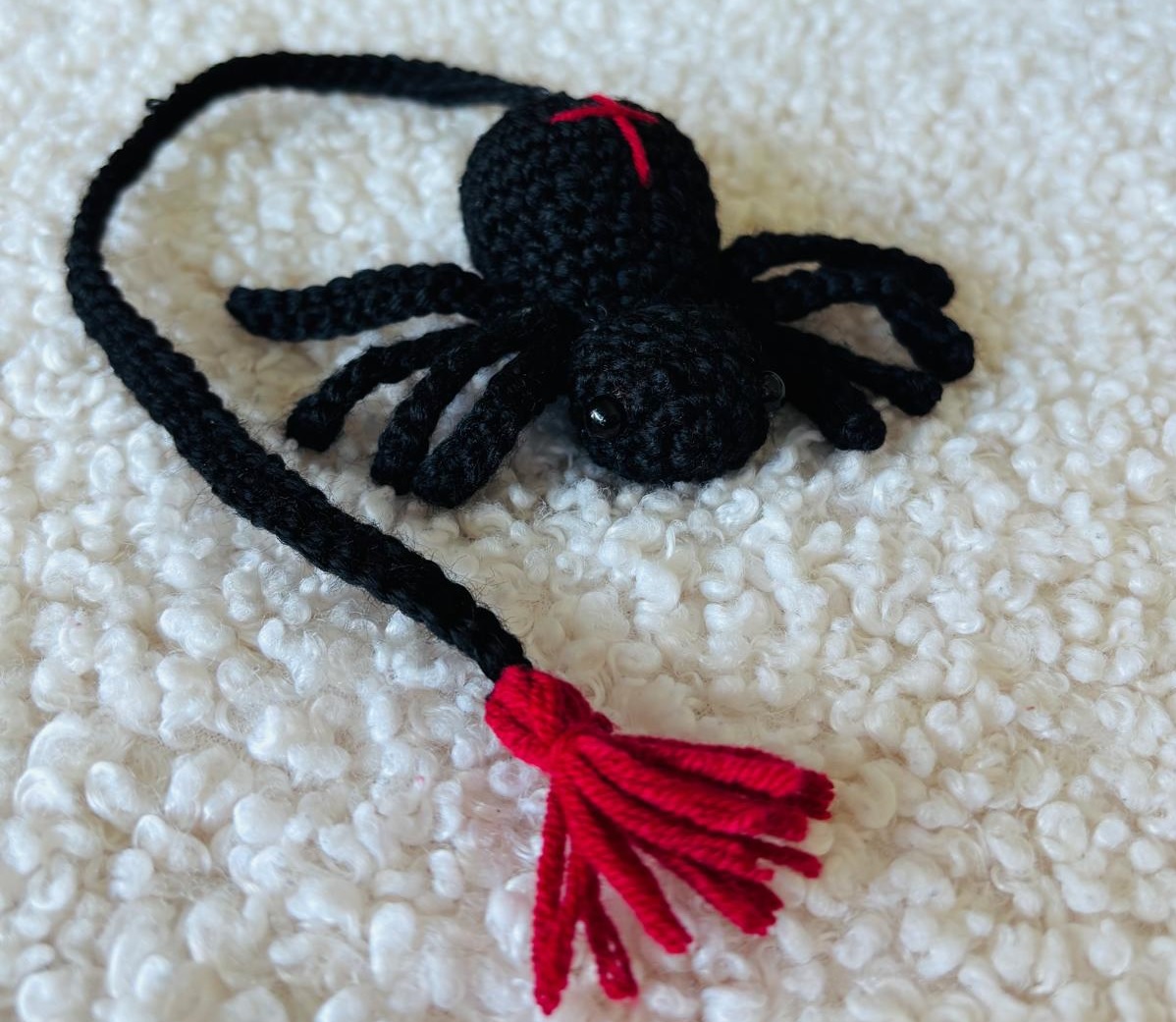 Gehäkelte Spinne Lesezeichen